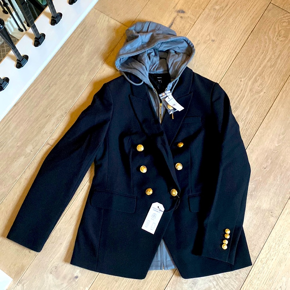 Double breasted blazer with hoodie dickie detail.